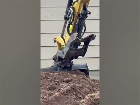 skid steer to dig backyard|jackhammer skids how to dig.